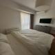 Banesë për Qira në Komuna e Qendrës, Shkup — Jepet me qira apartament i pajisur modern 60m² — fotografi 7