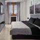Banesë për Qira 50 divizija 34, Skopje 1000, Komuna e Qendrës, Shkup. Kati 3 — Apartament modern i mobiluar 120m² në Centar — fotografi 5