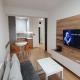 Banesë për Qira në Komuna e Qendrës, Shkup — Jepet me qira apartament i ri me një dhomë gjumi prapa East Gate — fotografi 2