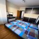 Banesë për Qira në Komuna e Qendrës, Shkup — Jepet me qira apartament tre-dhomësh i ri në Qendër, Salla Universale — fotografi 5