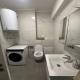 Banesë për Qira në Belasica, Komuna e Qendrës, Shkup — Jepet me qera apartament i ri, i pabanueshëm, dydhoresh në East Gate — fotografi 9