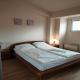 Banesë për Qira në Komuna e Qendrës, Shkup — Jepet me qira apartament pas sallës universale me garazh — fotografi 7
